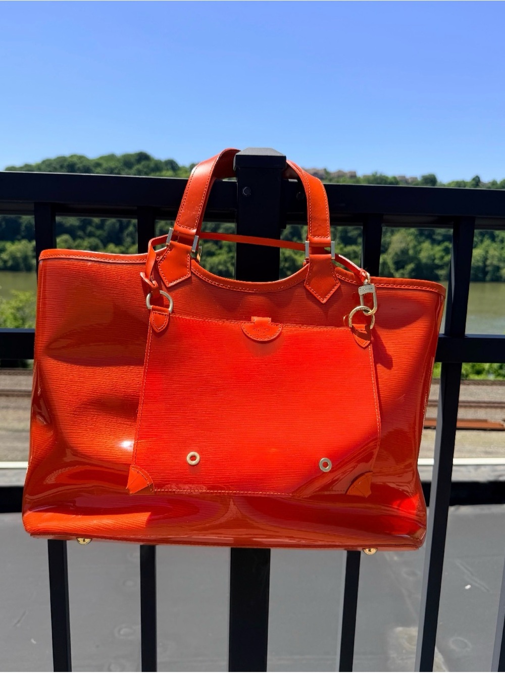 Louis Vuitton Epi Plage Lagoon Bay handbag in a vibrant orange